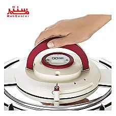 تصویر یک زودپز استیل با درب سفید و قرمز، طراحی مدرن و ارگونومیک که به راحتی در آشپزخانه قابل استفاده است. - دوم